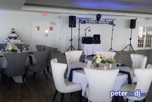 Indoor wedding reception DJ setup for Chris and Ashley's wedding at Lake Shore Yacht & Country Club, Cicero, NY.