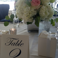 Table centerpieces: Chris and Ashley's wedding at Lake Shore Yacht & Country Club, Cicero, NY