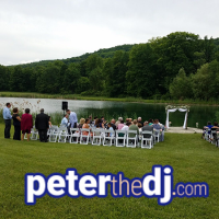 Sound setup for outdoor ceremony at Kimberly and Giovanni's wedding at Wolf Oak Acres in Oneida, NY, June 2018