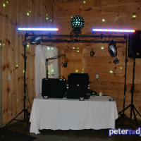 Indoor DJ setup (sound and lights) at Kimberly and Giovanni's wedding at Wolf Oak Acres in Oneida, NY, June 2018