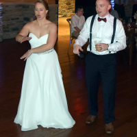 Bride and groom dancing at Emily and Nick's wedding at Tailwater Lodge, Altmar, NY. Photo by DJ Peter Naughton. October 2018
